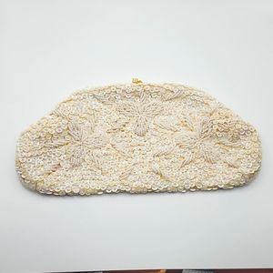 Vintage off white iridescent beaded clutch.